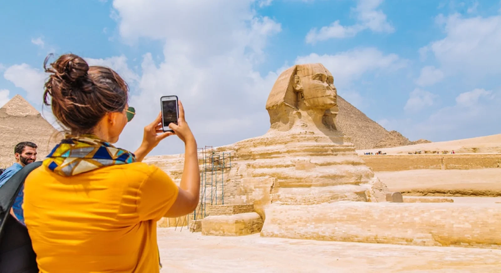 Tourists Exploring the Pyramids on an Egypt Budget Tour