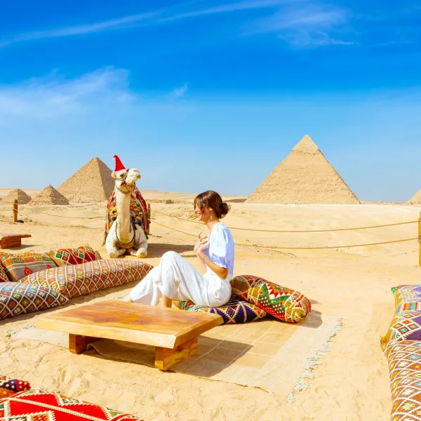 Majestic view of the Giza Pyramids under the winter sun during your Egypt Christmas tour