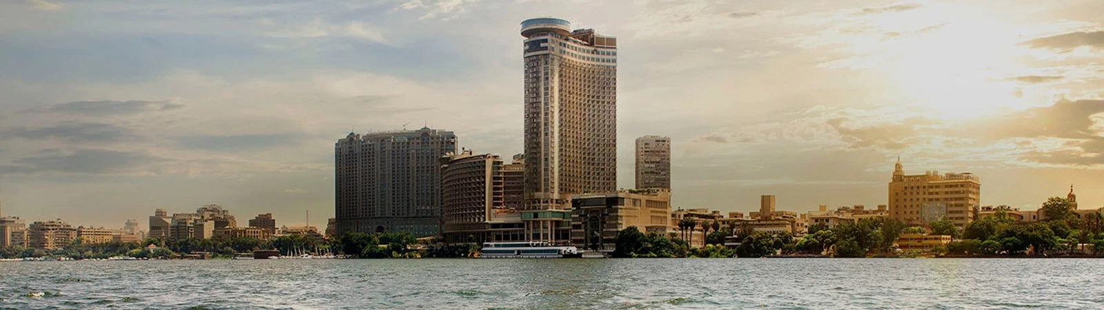 Luxurious rooms and suites offer views across the River Nile at Hilton Cairo Grand Nile.