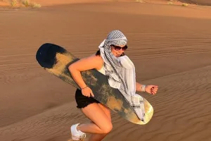 Abu Dhabi Desert Safari with BBQ Dinner, Camel Ride & Sandboarding