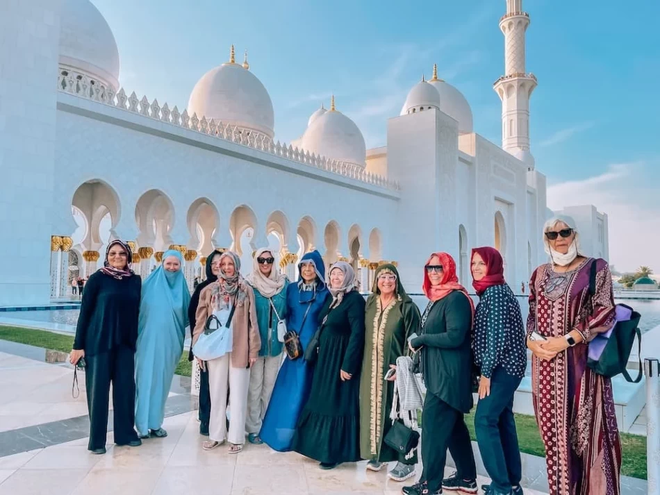 Tourists exploring Abu Dhabi attractions at Grand Mosque