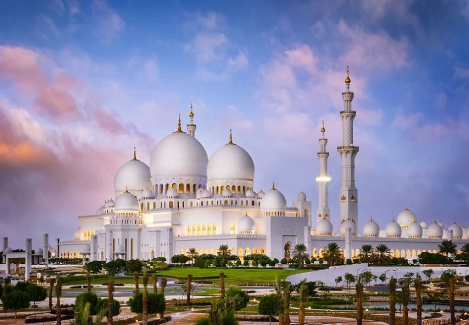 Tourists exploring Abu Dhabi attractions at Grand Mosque