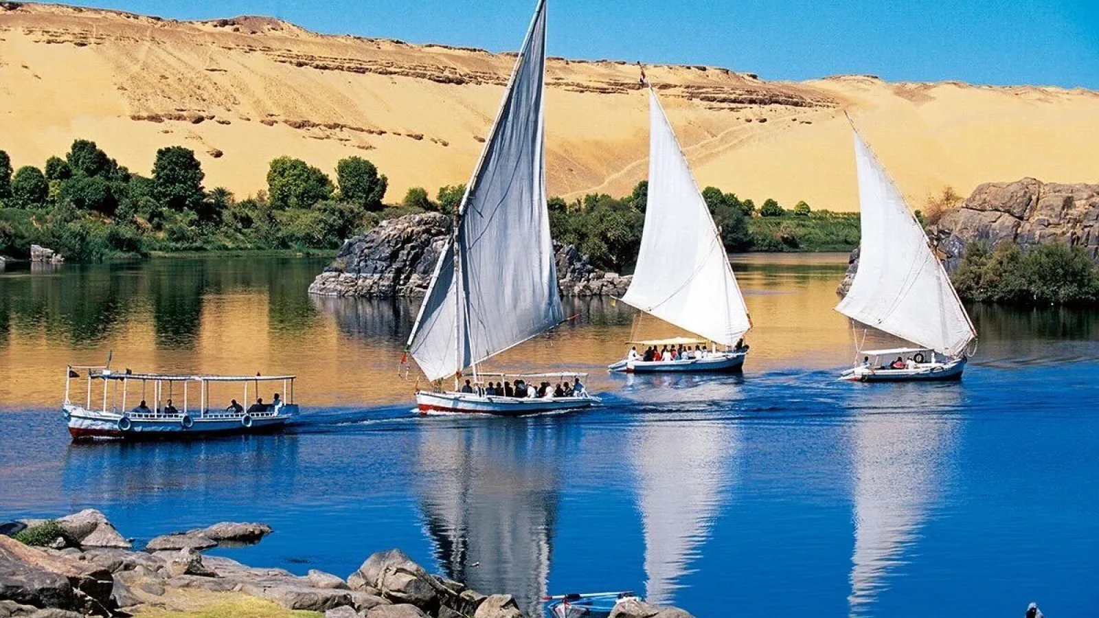 Classic felucca ride along the Nile River landscape