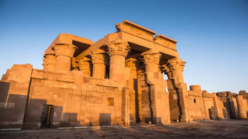 Kom Ombo Temple columns and statues at sunrise