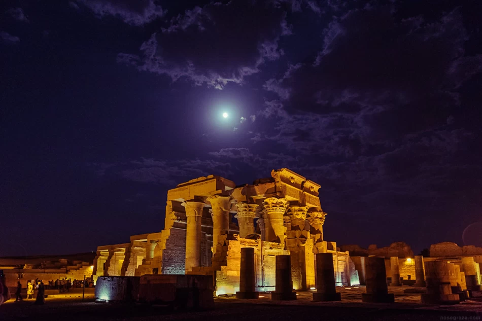 Kom Ombo Temple illuminated at night with dramatic lighting on ancient columns