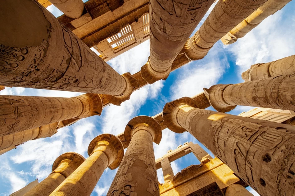 Massive stone columns at Karnak Temple in Luxor, Egypt