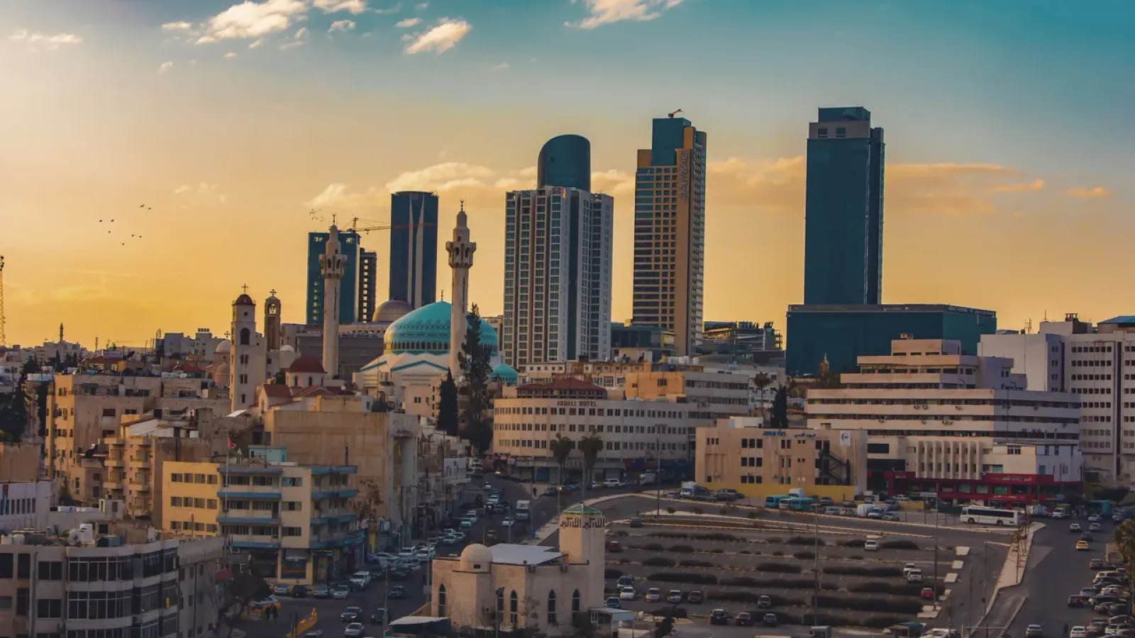 Panoramic view of Amman city bathed in sunset light
