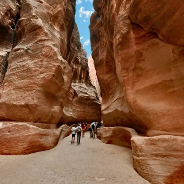 The Siq is a narrow natural gorge leading to Petra's Treasury