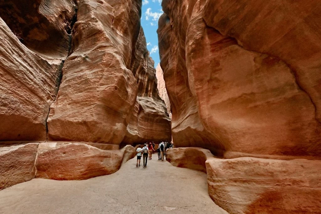 The Siq is a narrow natural gorge leading to Petra's Treasury