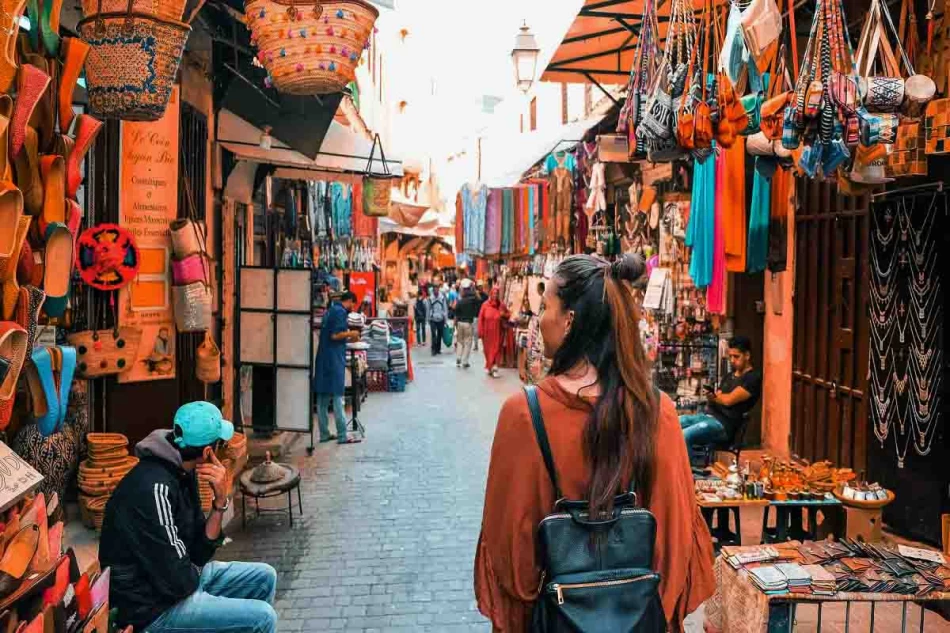 Colorful market stalls and narrow alleys in the bustling Fez souk, Morocco
