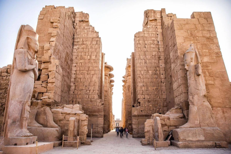 The grand Karnak Temple complex in Luxor, Egypt, with towering columns and intricate hieroglyphs.