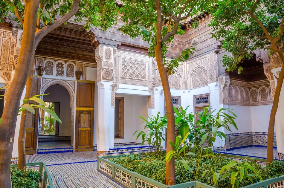 Courtyards and intricate carved stucco of Bahia Palace in Marrakech, Morocco