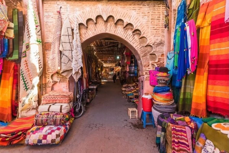 Colorful Marrakech souk with vibrant textiles, lanterns, spices