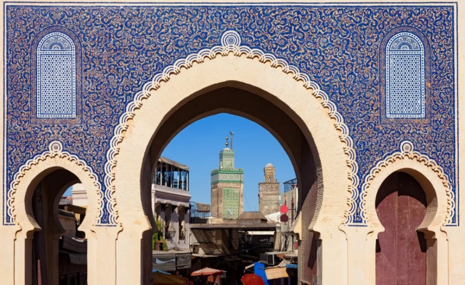 Intricate Moroccan architecture in Fez featuring historic medina buildings, ornate doors