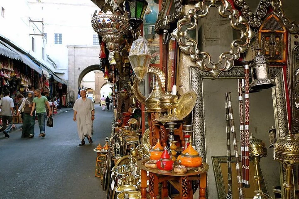 Bustling Casablanca souk with colorful stalls, local goods, and people shopping in Morocco