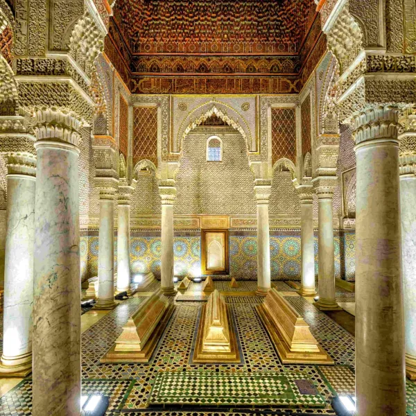 Ornate interior chamber of the Saadian Tombs in Marrakech with detailed carvings