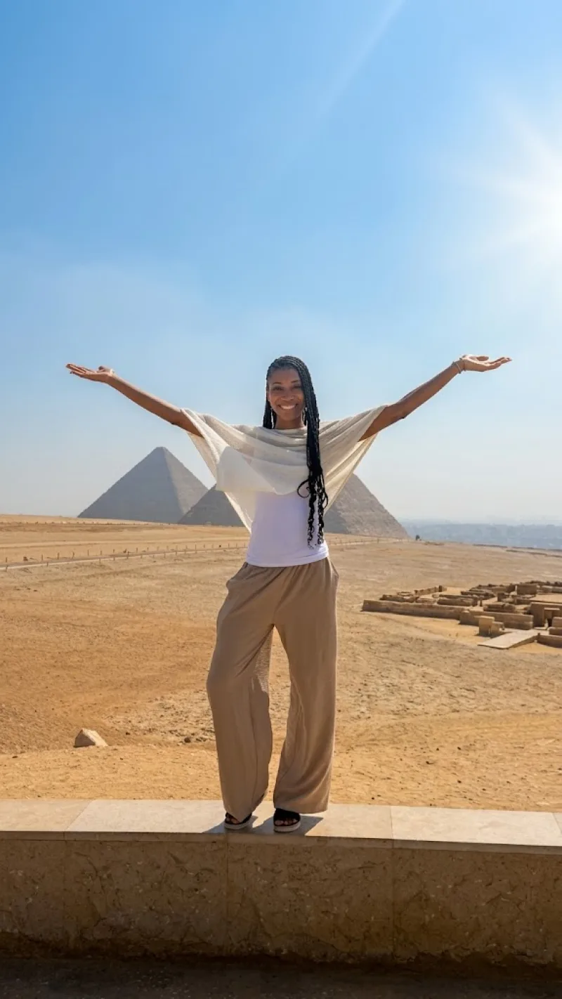 Egypt Day Trips guest enjoing at Giza Pyramids